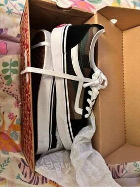 Vans Camo and Black Low-Top Sneakers